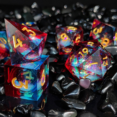 El juego de dados de resina multicolor de arena de flujo