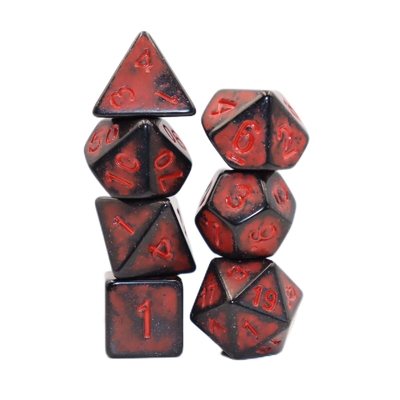 Antiguo personaje de resina roja con espalda negra jugando a los dados de mesa.